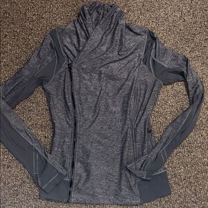 Lululemon Gray Women's Zip-Up Top crosses side to side with one zipper inside